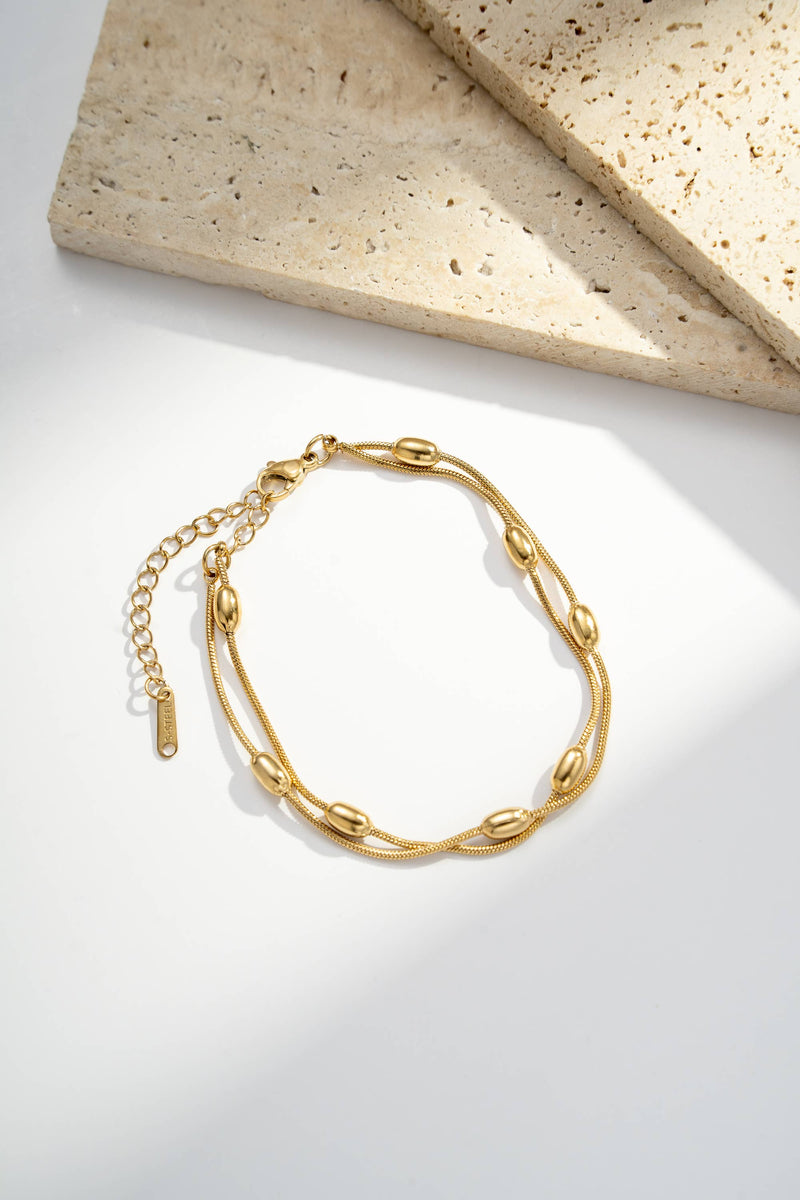 Doppelkettenarmband mit ovalen Perlen aus Edelstahl