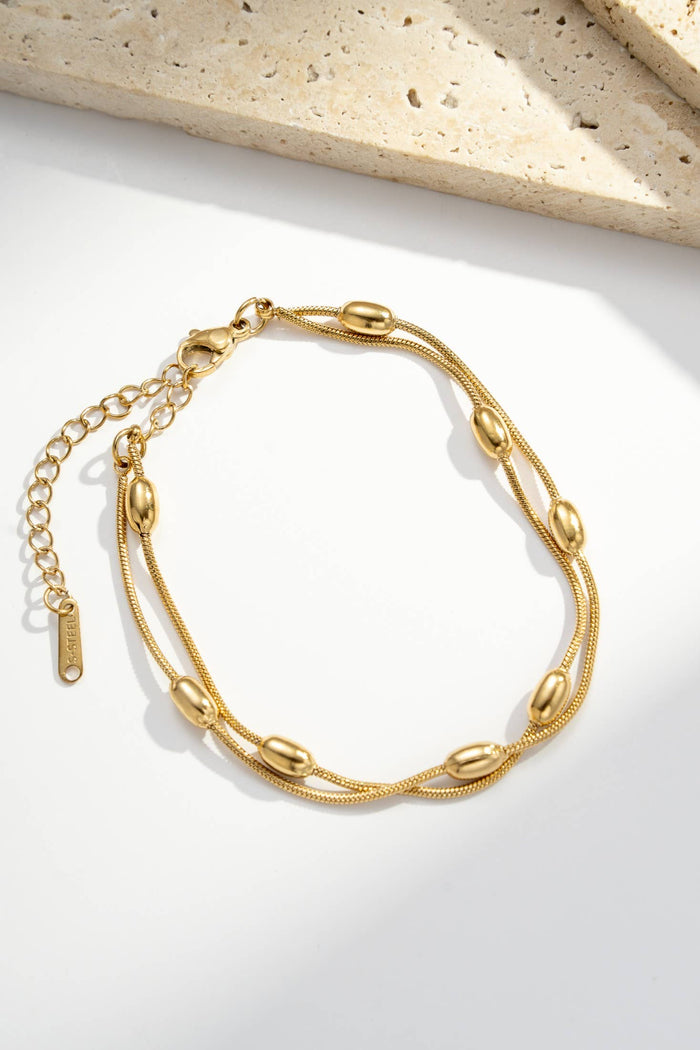 Doppelkettenarmband mit ovalen Perlen aus Edelstahl